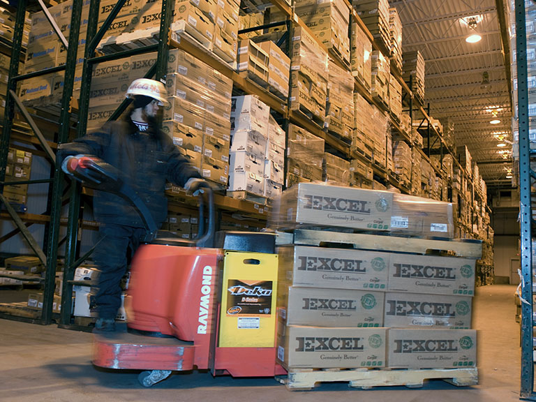 Cargill worker on forklift with Excel beef boxes